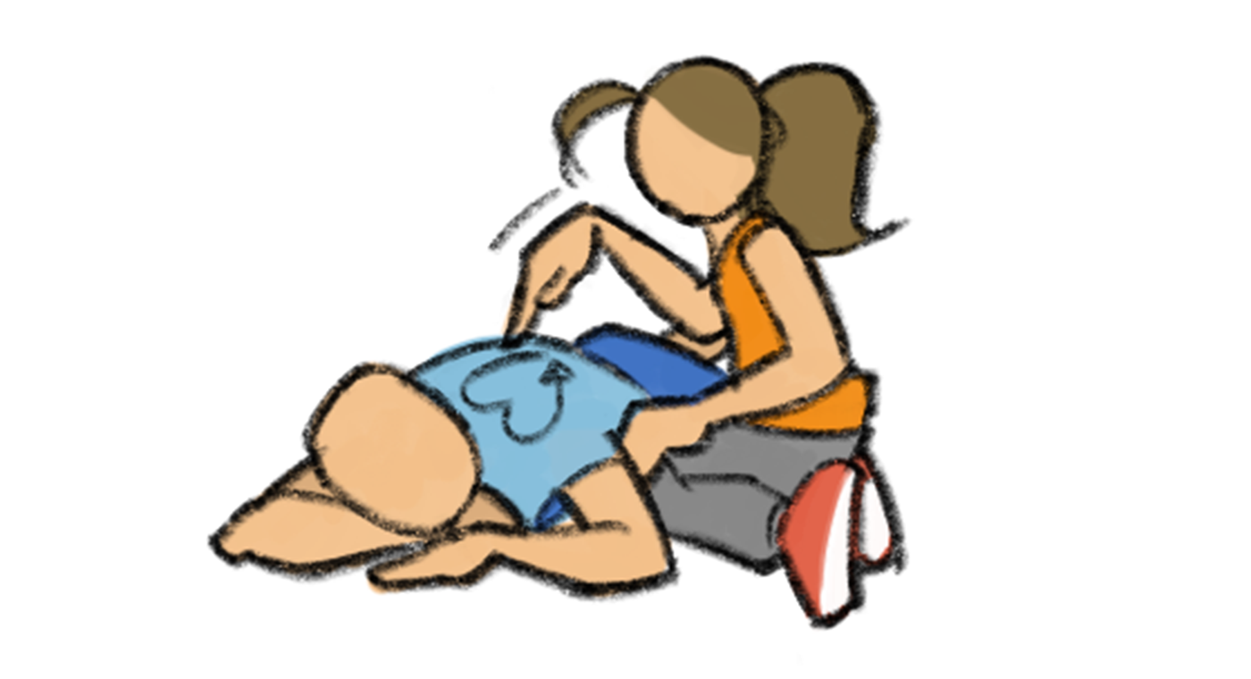Dessin: une élève dessine un coeur avec son doigt sur le dos d'un camarade couché sur le ventre.