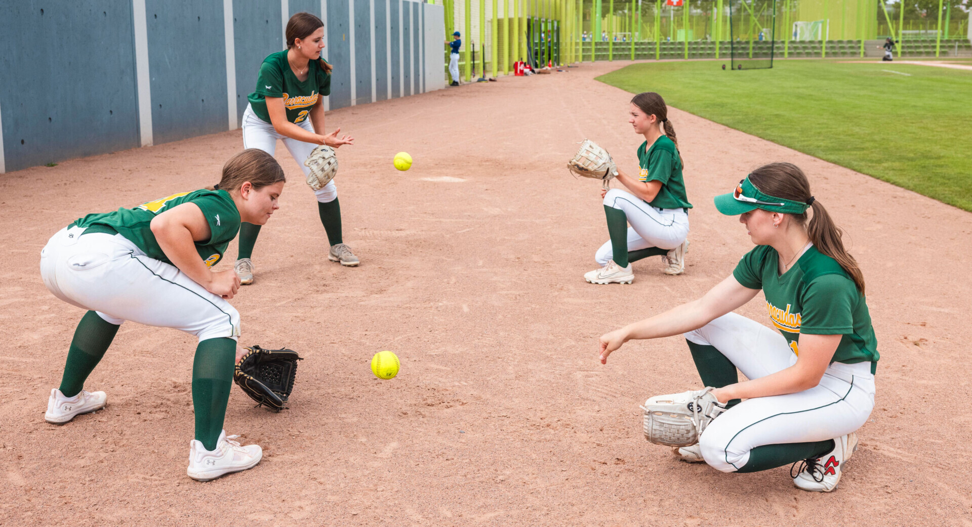 Kinder und Jugendliche bei Spielen und Trainingsformen für Baseball und Softball. Foto: BASPO / Charlène Mamie: Infield/Outfield