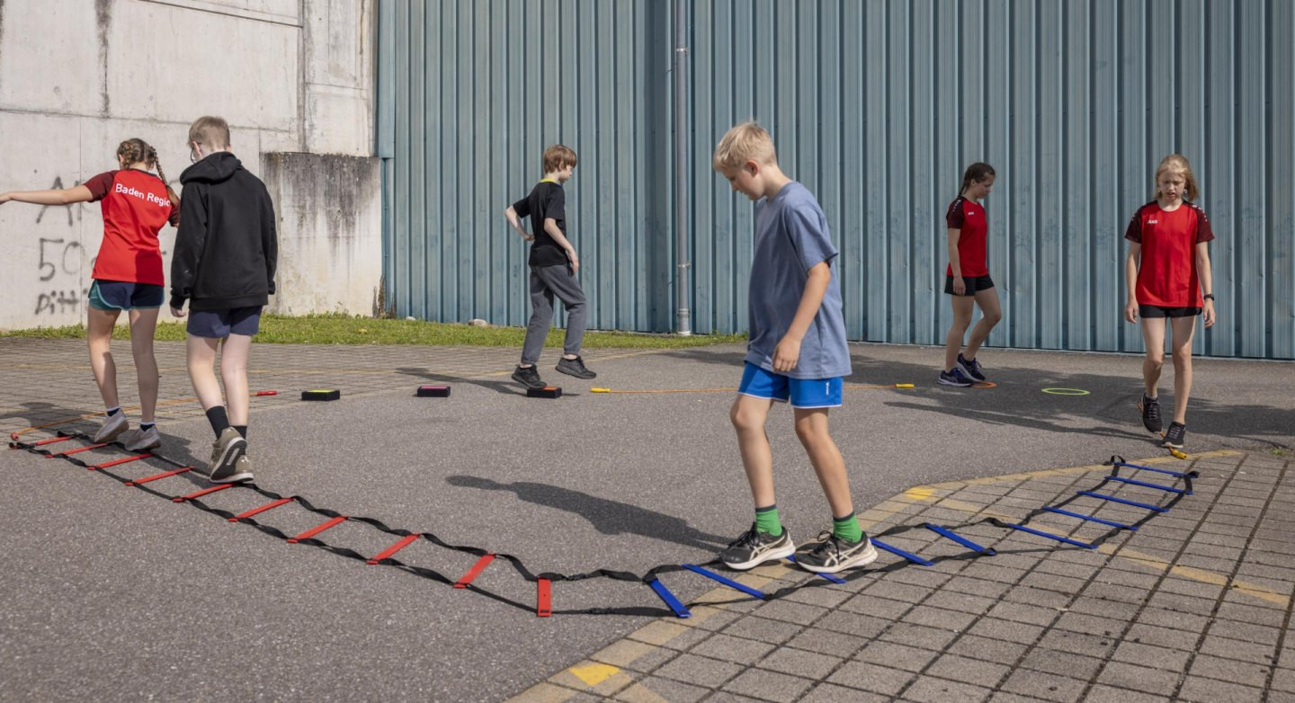 Curling – Formes fondamentales de mouvements: En dehors de la glace – Se tenir en équilibre