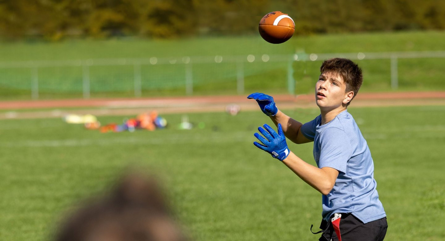 Football américain – 1re forme caractéristique: Gagner du terrain de façon coordonnée et ciblée grâce à des passes