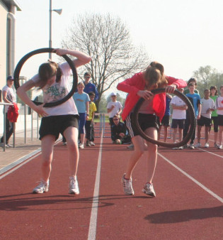 Atletica leggera Lancio del disco Passare attraverso i cerchi